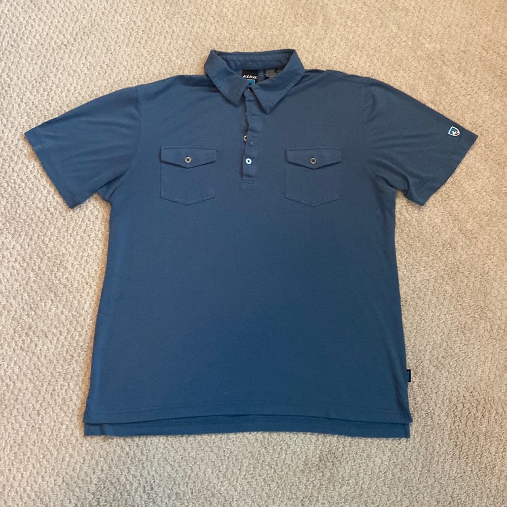 Kuhl lightweight tech polo. Light blue. Size L. Front flap pockets.